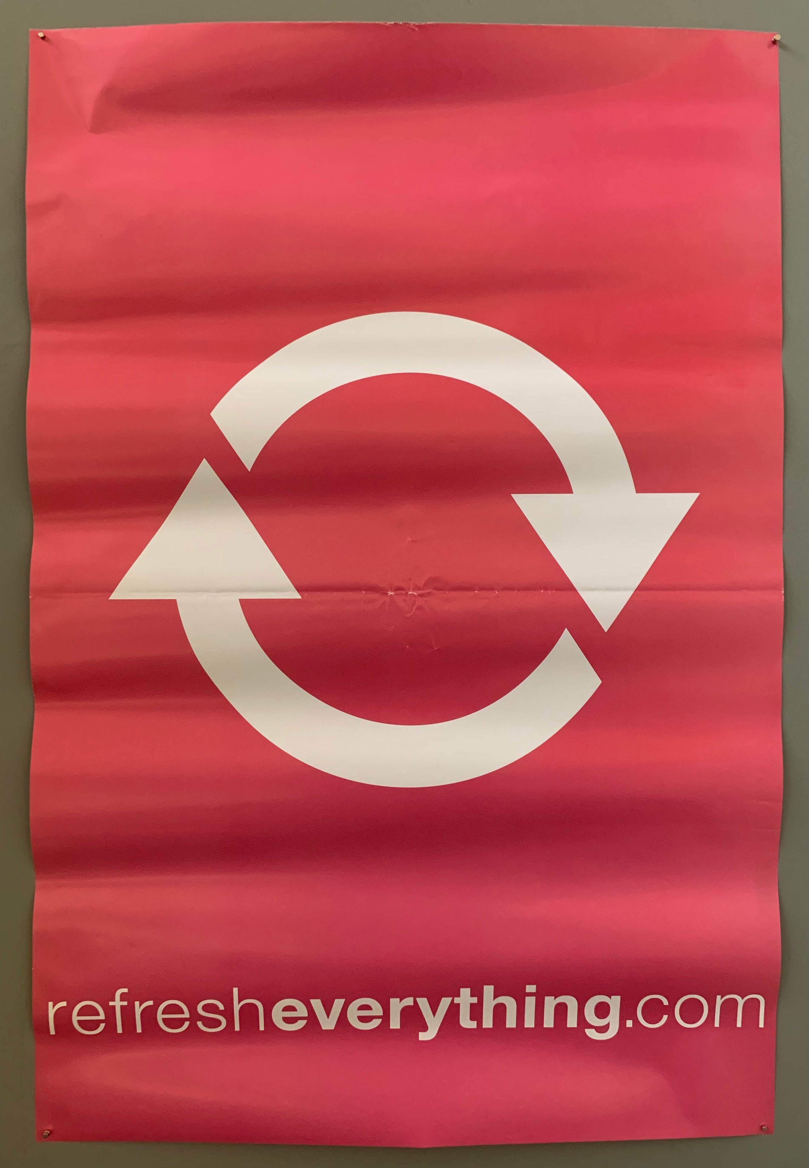 poster of a two white circular arrows on a pink background