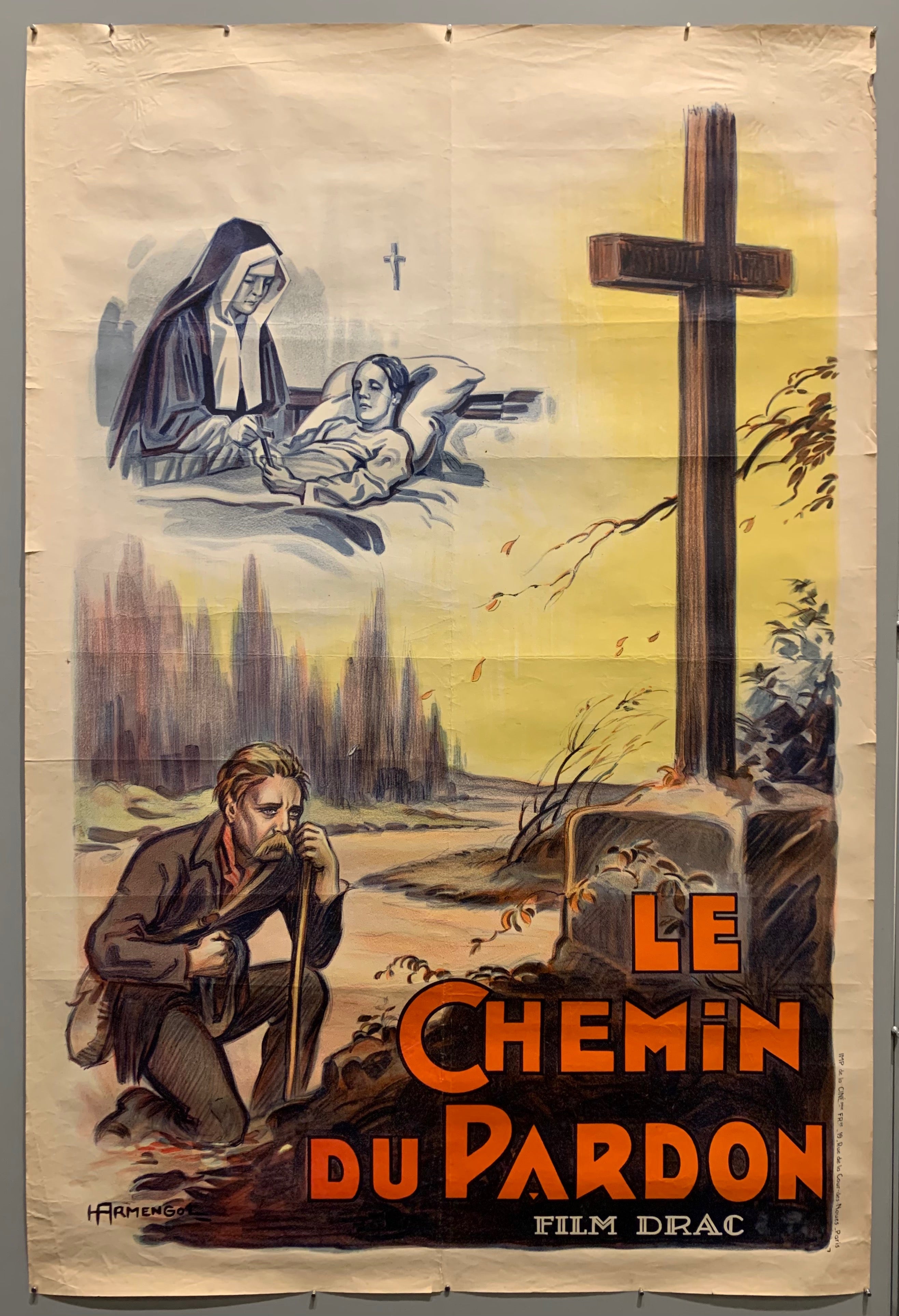 Poster of a man kneeling before a cross. 