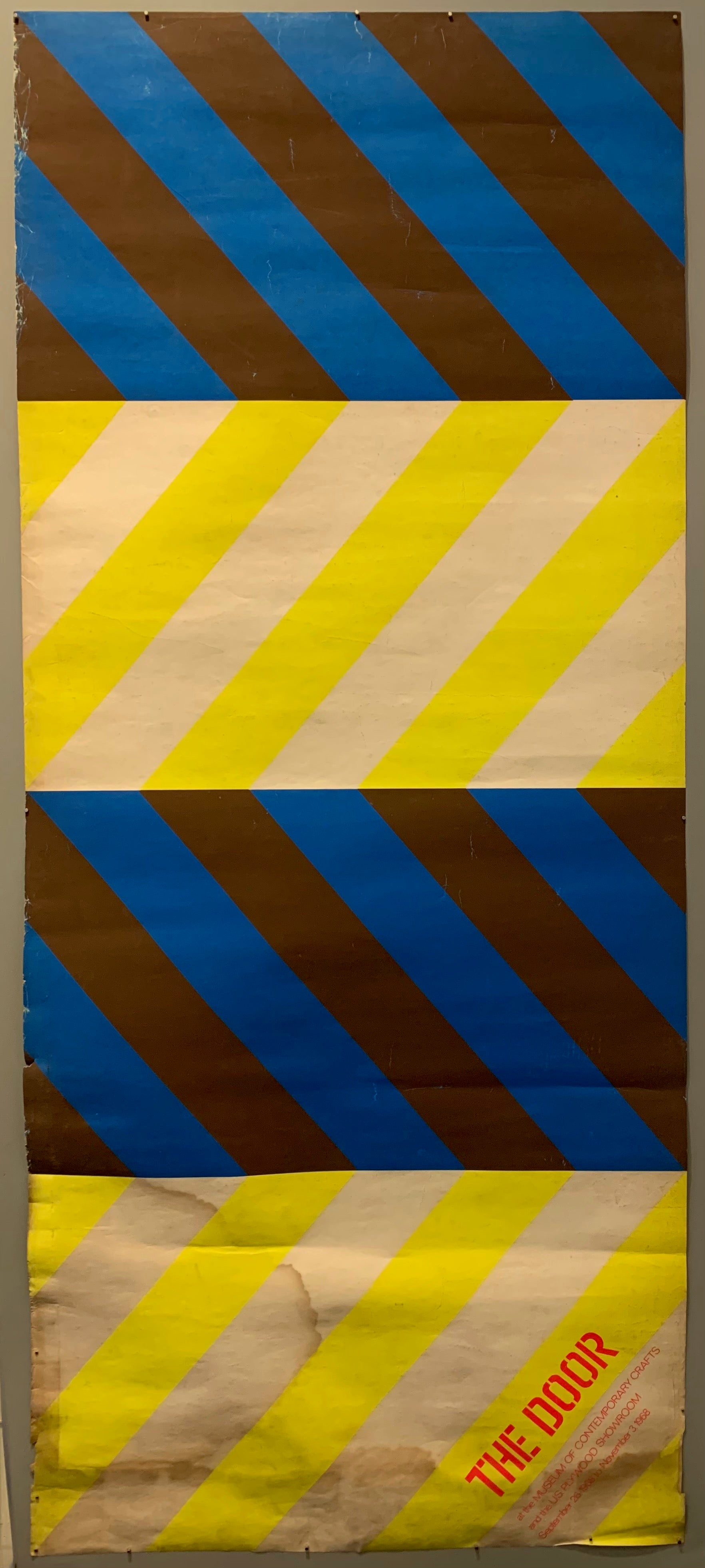 This mix of multicolored diagonals is eye-catching and bold and creates a chevron print. The main colors are yellow and white and black and blue.