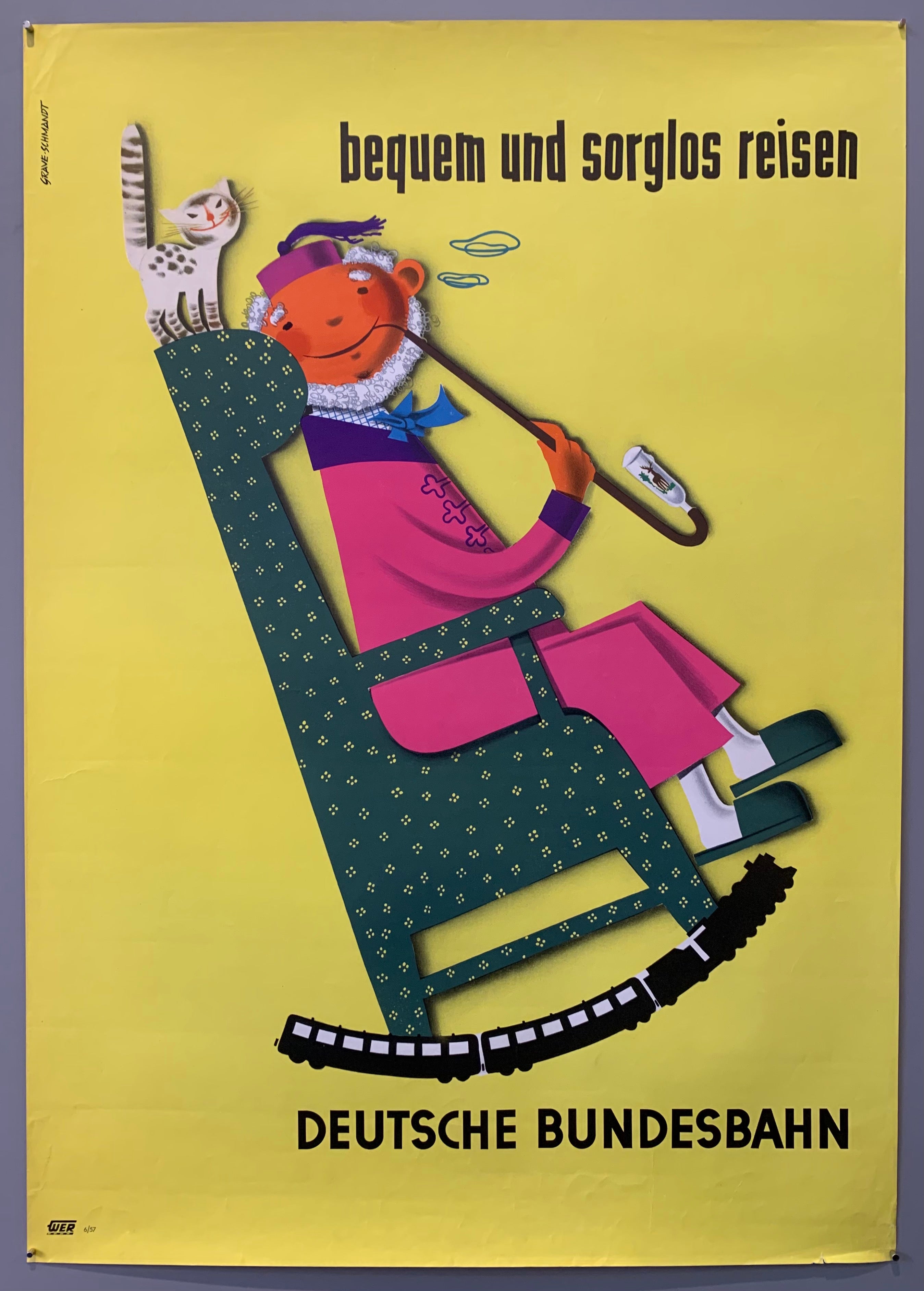 Poster for the Deutsche Bundesbahn advertising comfortable train travel. Pictured is a man in a robe smoking a pipe in a rocking chair with a cat.