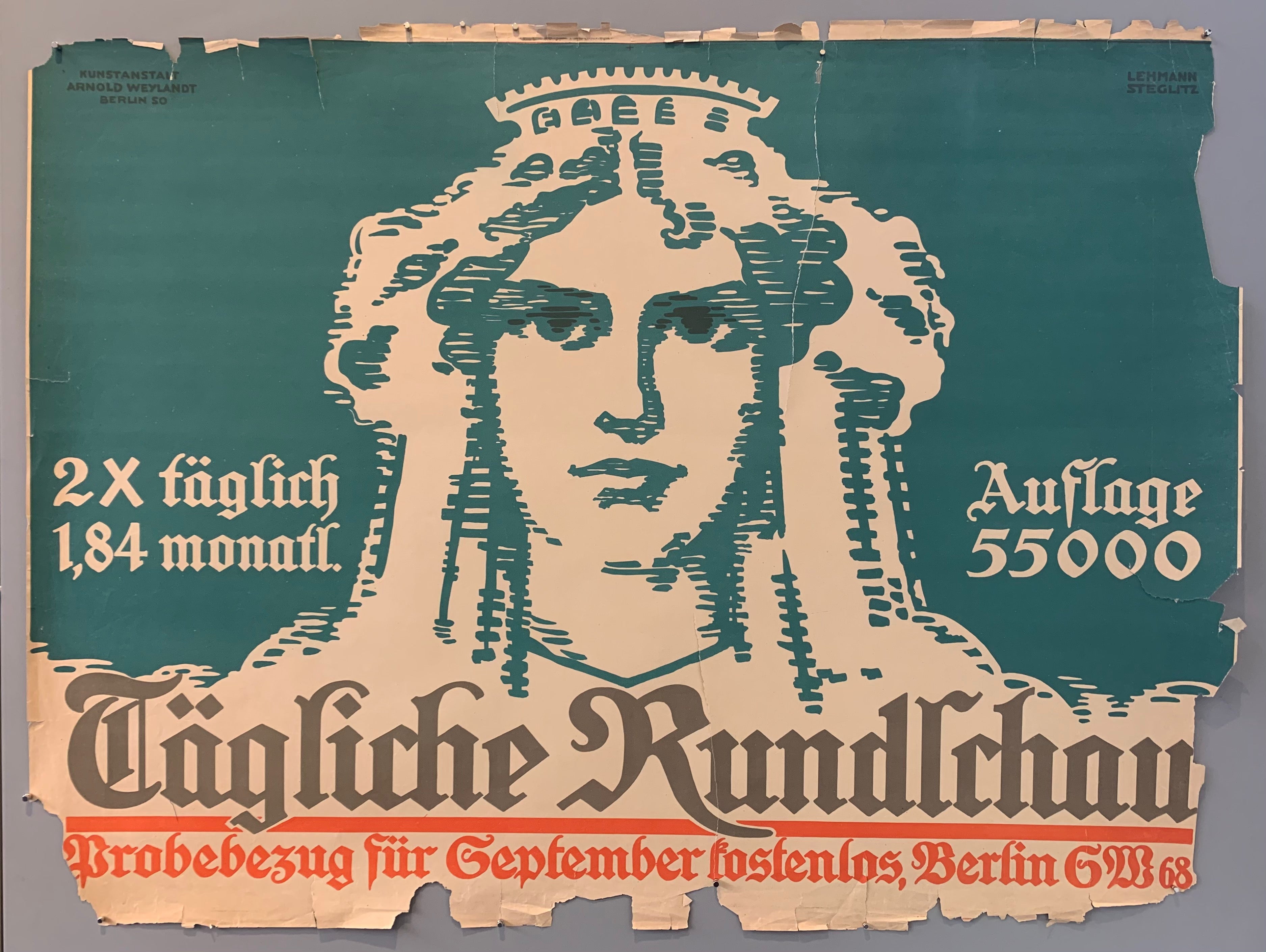 The daily Rundschau was a newspaper published from 1945 to 1955. It was published in Berlin by the Soviet army in the Soviet occupation zone. This poster advertises sample purchases in september for free, with a woman in the middle. Background is turquoise with red and white text.
