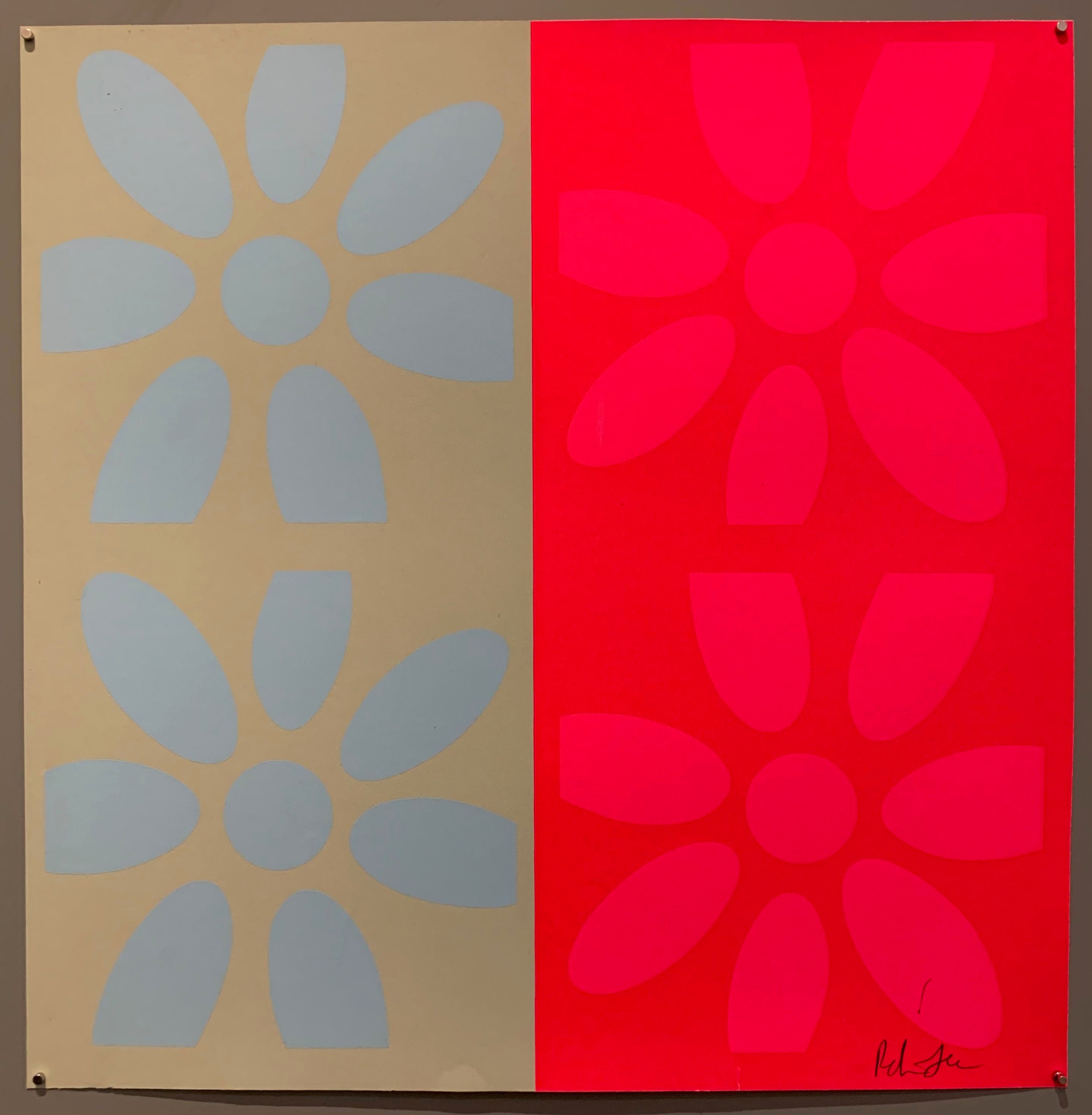 A square of four large motifs on paper. The colors are light tan with light blue flowers, the other is red with hot pink flowers.